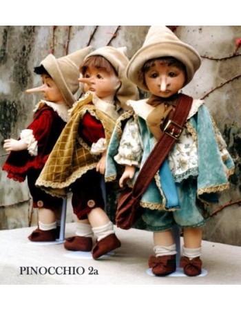 Pinocchio  seriously happy - Dolls porcelain fairy tales